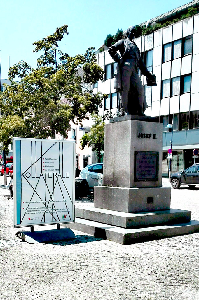 Kollaterale-Plakat am Kaiser-Josef-Platz